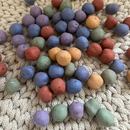 Blumenmurmeln im Organzasäckchen