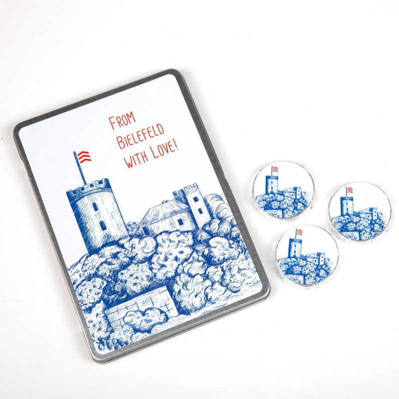 zwölf Schokoladentaler in dekorativer Geschenkbox mit dem Motiv der Sparrenburg und dem Motto "from Bielefeld with love" Erhältlich in vier Farben jetzt bei GOKAL kauf lokal